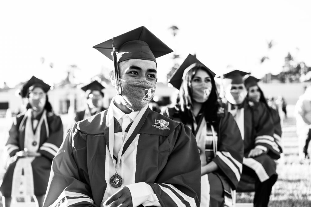 Student seated at graduation ceremony